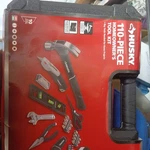 Husky 110-piece Homeowner's Tool Kit Hammer Pliers Wrench Hard Case Black Red. Fixed Price $50.00.