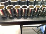 Popular Mechanics 14 Piece Socket Set 1/2" Drive Metric. Fixed Price $24.50.
