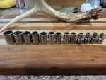 Snap On Tools 113tmmy 13 Pc. 1/4" Dr. Metric 6 Pt. Shallow Socket Set 4-15mm. Fixed Price $125.00.