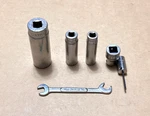 6 - Snap-on Tools, Including 4 Sockets, Open-end Wrench, And Hex Socket Driver. Fixed Price $45.00.